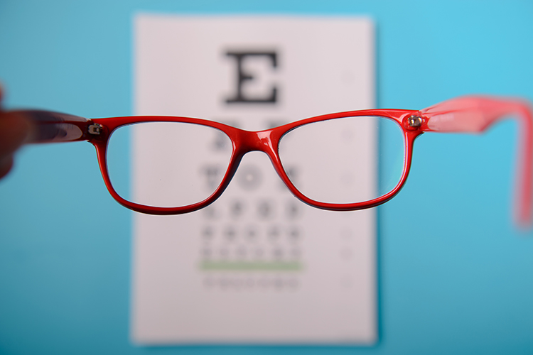 Glasses with eye chart.